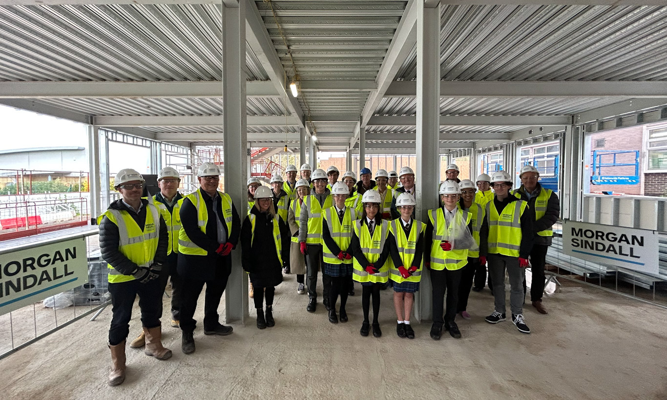 Morgan Sindall construction celebrates with steel signing at the castle school
