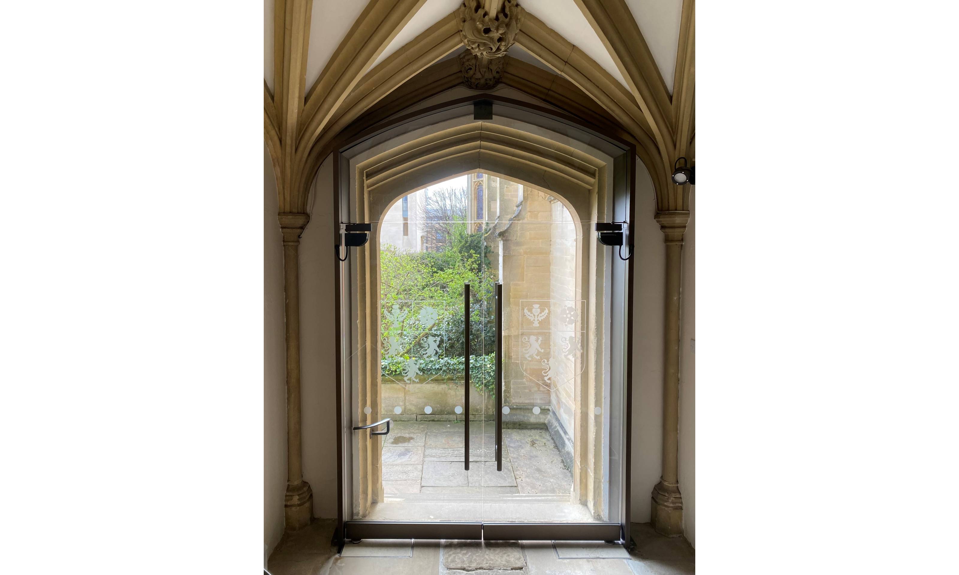 Invisible door automation opens historic Oxford college entrance